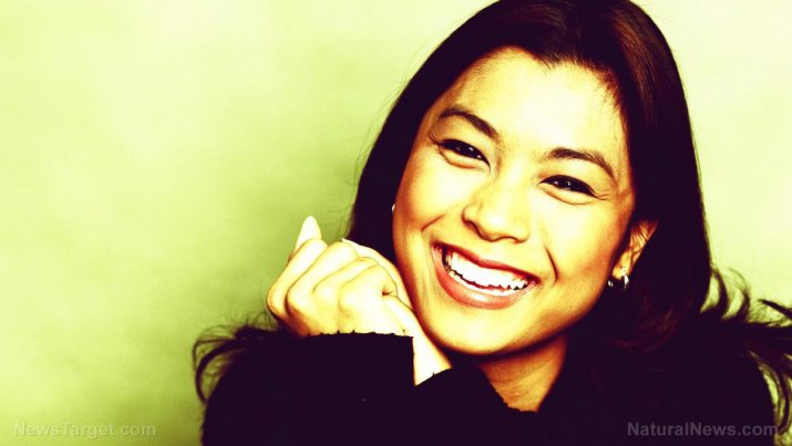 Woman-Face-Smiling-Teeth-715x403.jpg